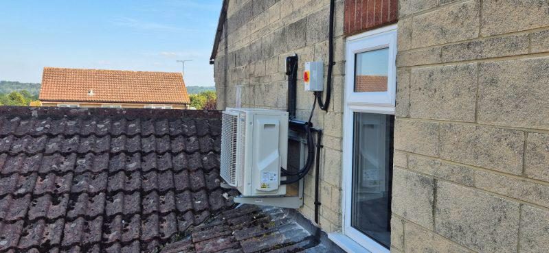 Daikin 7kW and 3.5kW air conditioning outdoor units with internal units installed, Poole