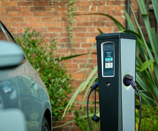 EV charging pedestal installed outdoors