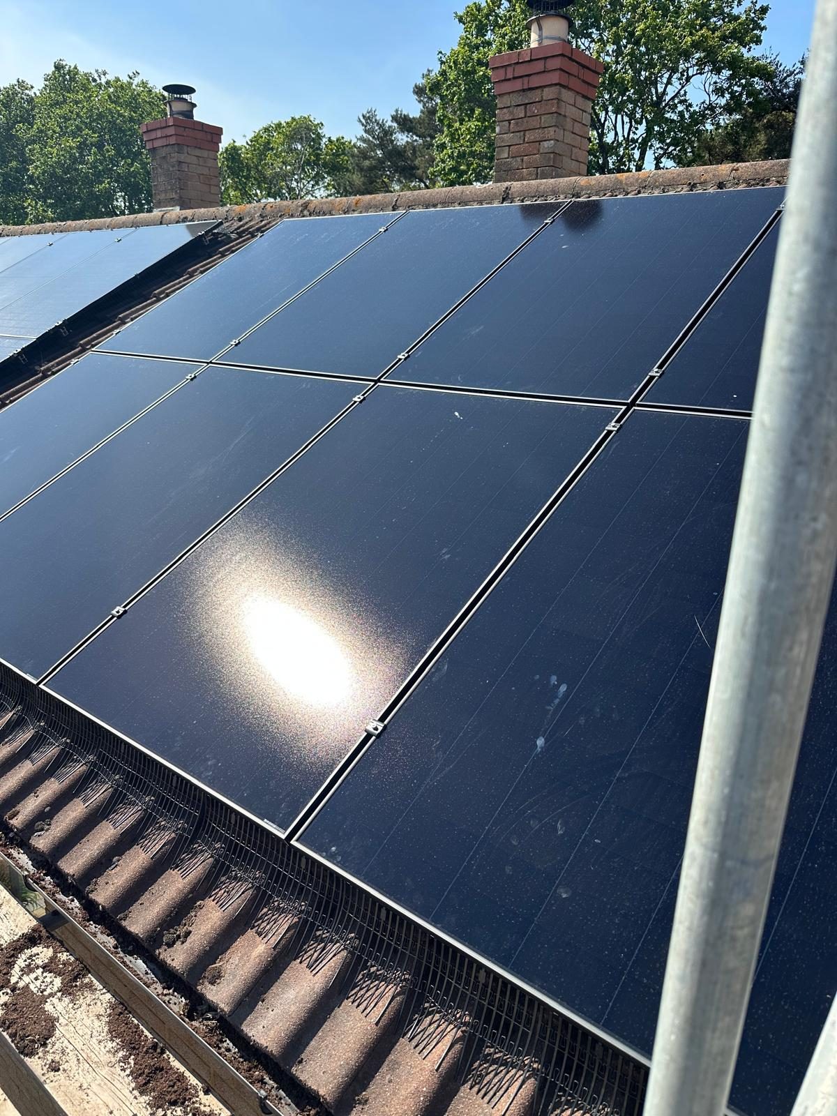 Close-up of solar panels installed on a roof