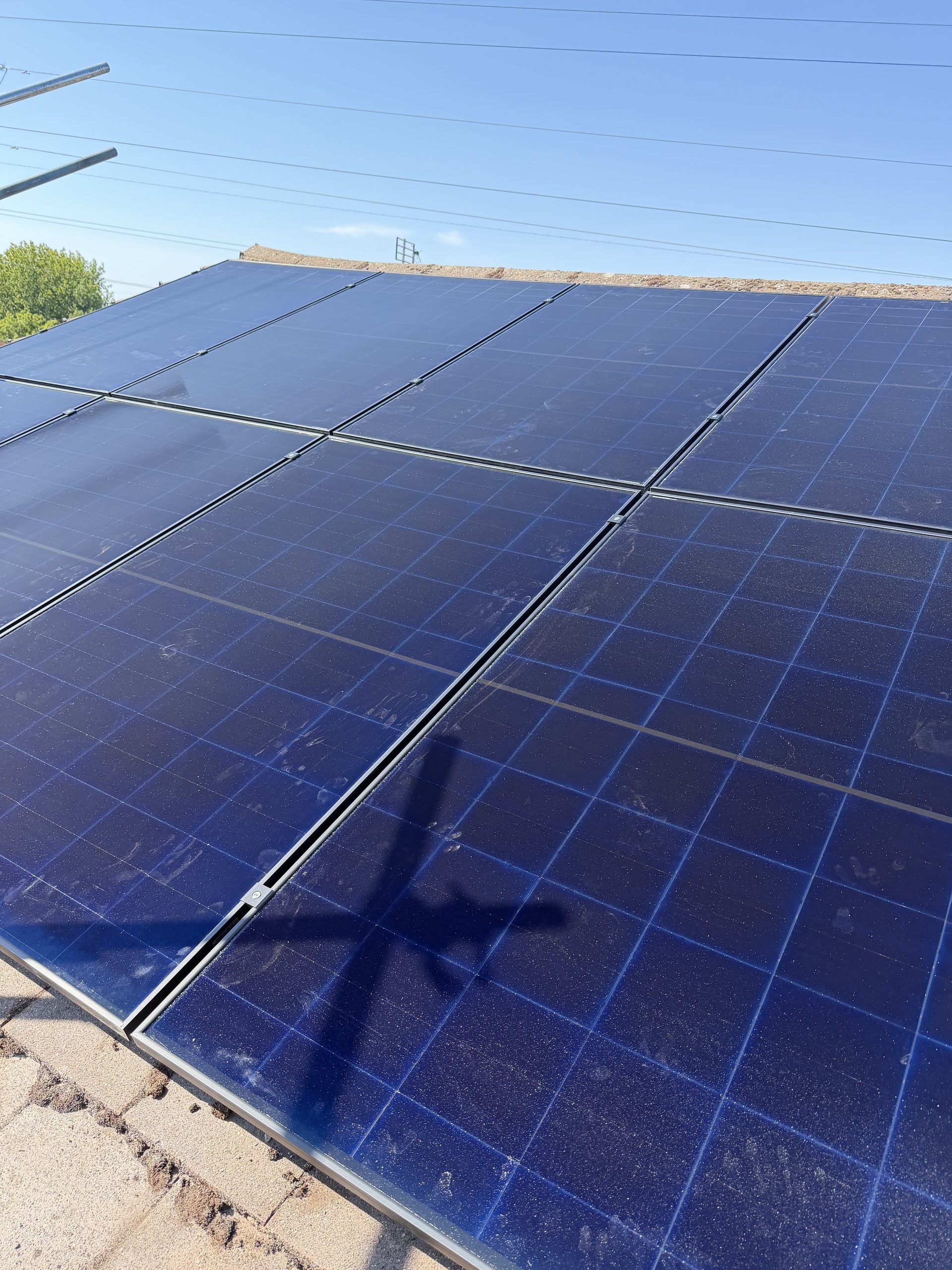 Close-up of Astronergy N7 bifacial solar panels installed on a roof in Poole